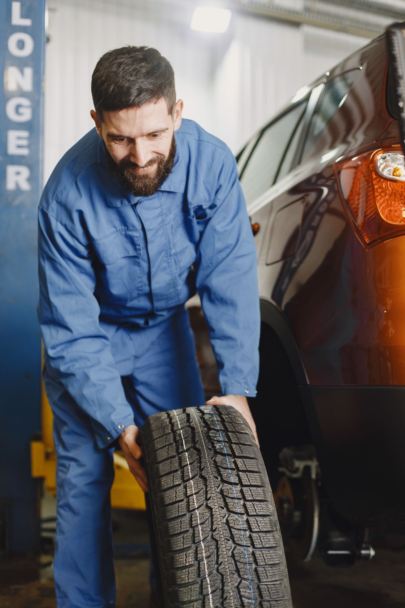 Mechanics working in a garage